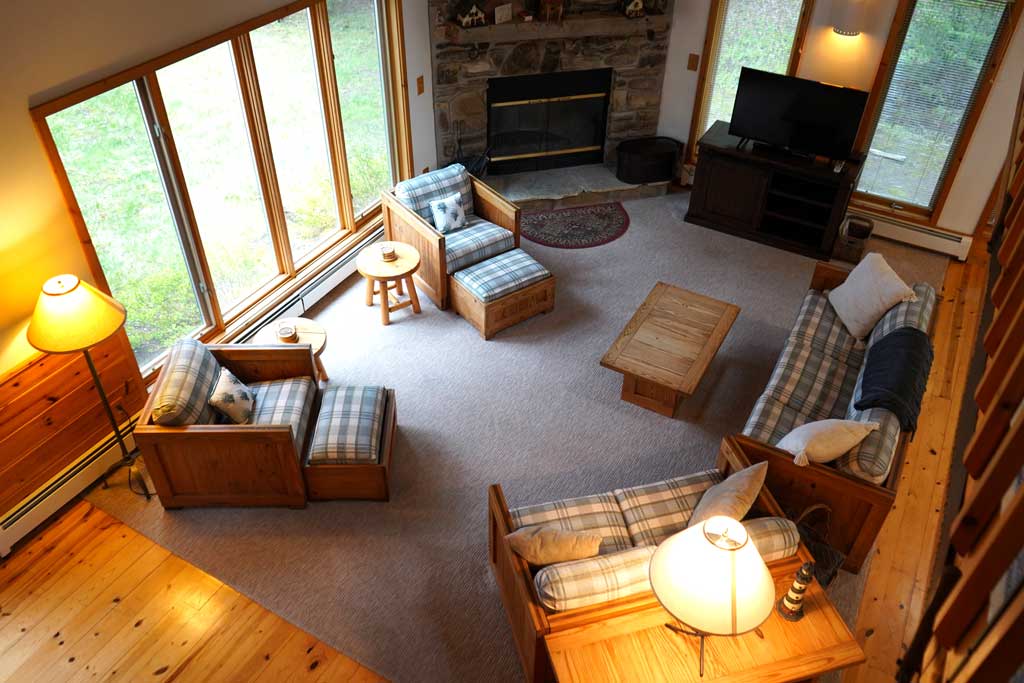 Carlson's Europe Lake Guest House living room and fireplace